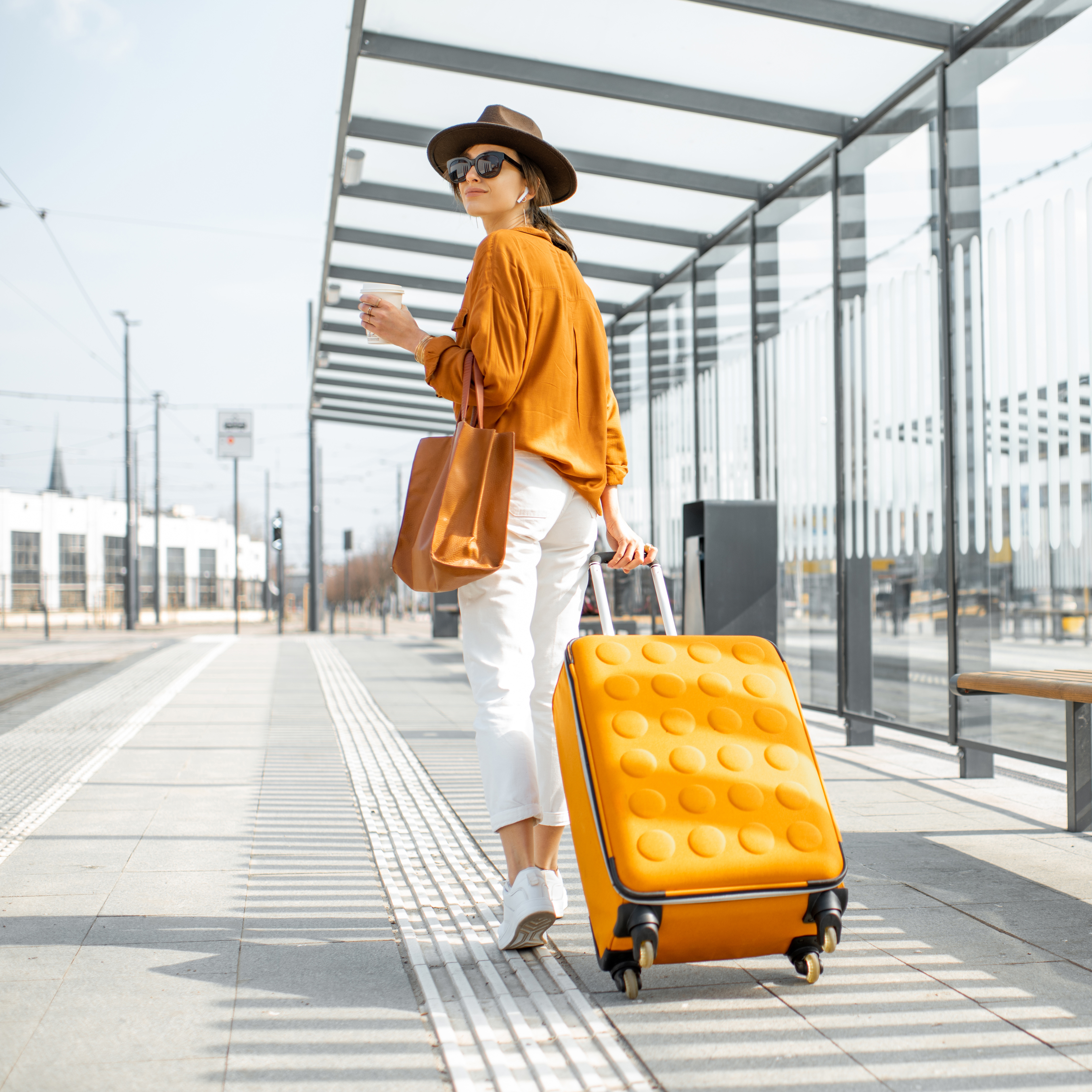 woman with a yellow suitcase